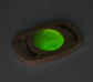 Panell sensorial verd amb marc de fusta i nanses que brilla en la foscor