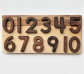 Números para encajar del 1 al 10 en base de madera